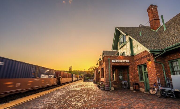 Flagstaff Train Station with passing train