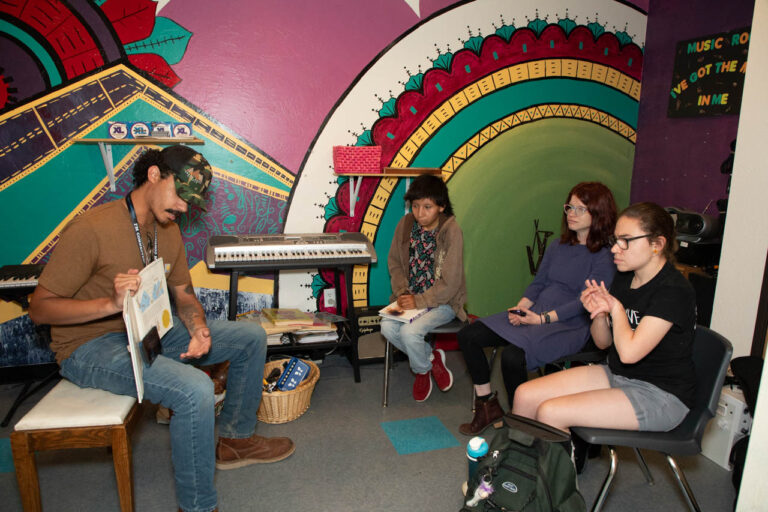 QC instructor teaches clients.