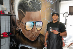 Jabarha Nichols with Kuttz mural