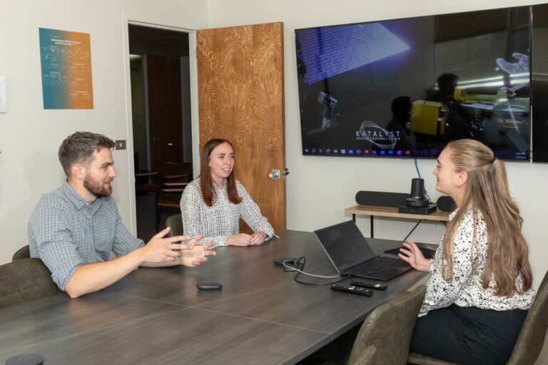 Katalyst employees in a conference room.