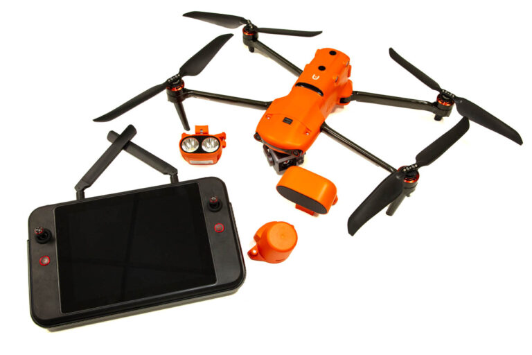 FireFlight drone with controller and components.