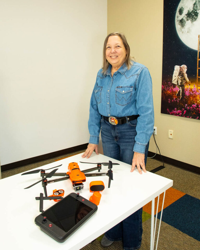 Ariel Strong with drone and accessories.