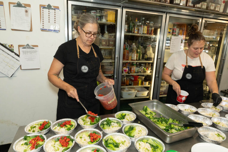Laura Chamberlin and Elysse add veggies to weekly meals.